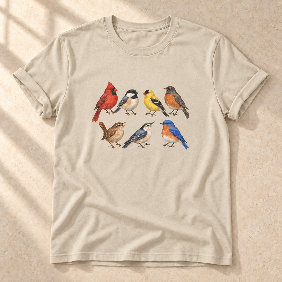 Sieben Singvögel – Unisex Vogel-T-Shirt in Sand