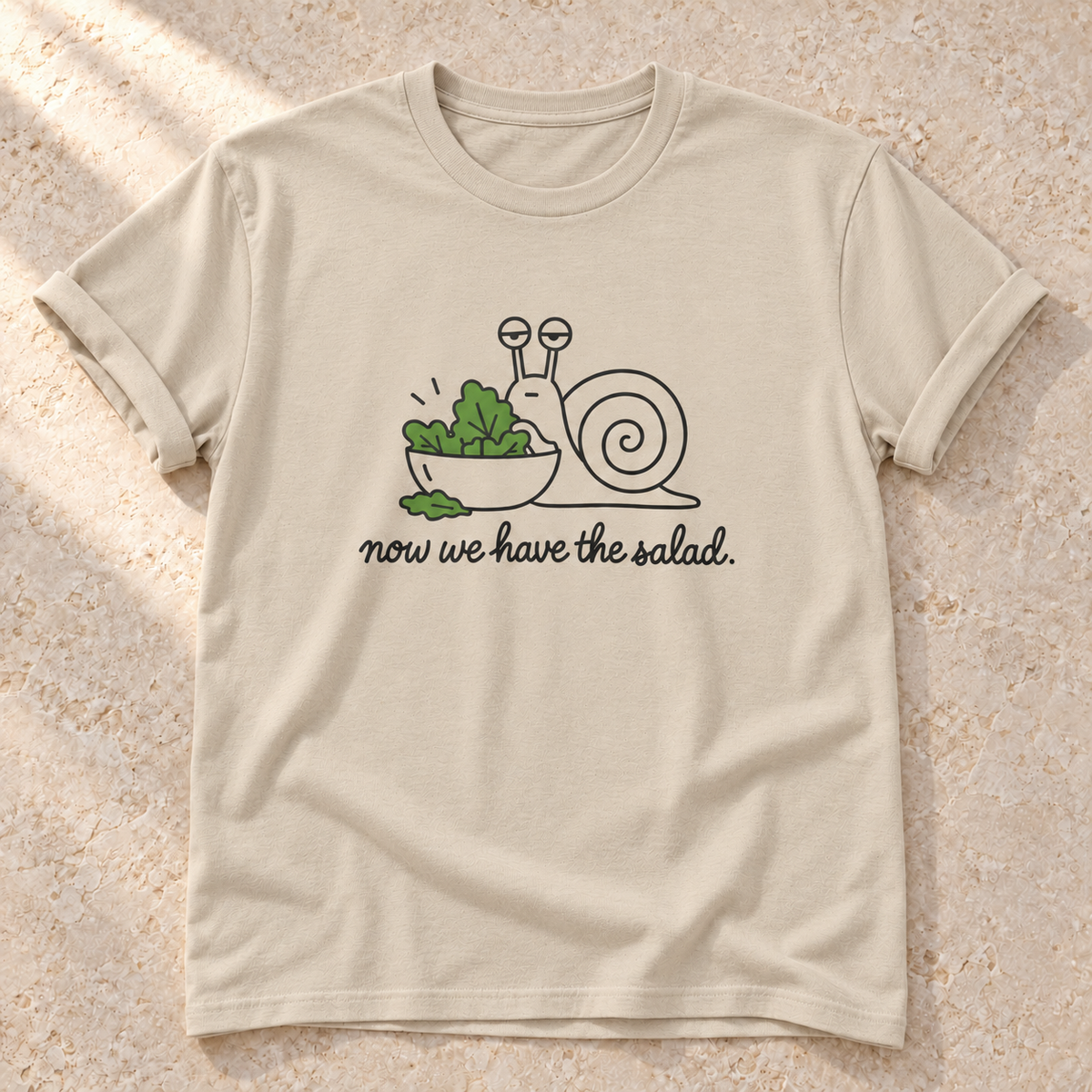 Now We Have the Salad. – Unisex Schnecken-T-Shirt in Sand